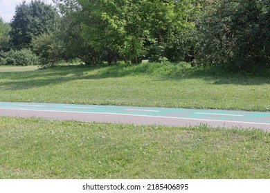 Asphalt Paths In An Open Green Landscape Park, Kolomenskoye, August 2022