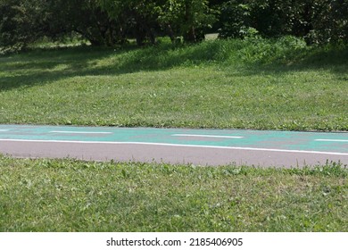 Asphalt Paths In An Open Green Landscape Park, Kolomenskoye, August 2022