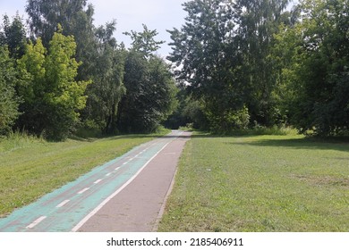 Asphalt Paths In An Open Green Landscape Park, Kolomenskoye, August 2022