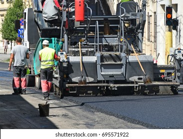 Asphalt Paving Machinery At Work On The Street