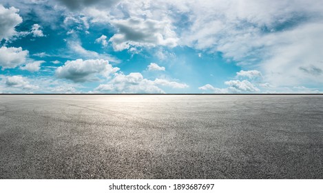 Asphalt race track road and sky clouds.Road ground background. - Shutterstock ID 1893687697