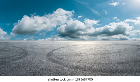 Asphalt Race Track Road And Sky Clouds.Road Ground Background.