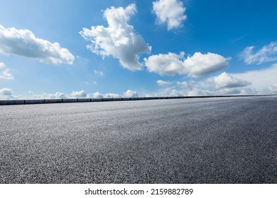 Asphalt Road And Beautiful Sky Cloud Landscape Under Blue Sky