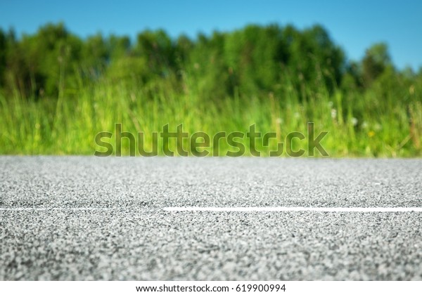 Asphalt road\
in beautiful spring day at\
countryside