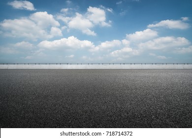 asphalt road and blue sky