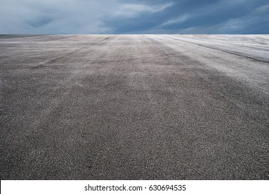 Asphalt road and blue sky background