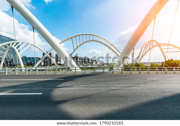 Asphalt road\
and Bridge building in\
Shanghai,China.