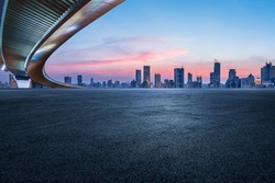 Asphalt Road And Bridge With City Skyline In Shanghai At Sunset, China. 