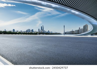Asphalt road and bridge with modern city buildings scenery in Guangzhou