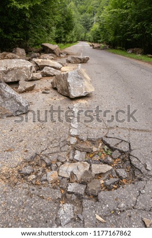 Potholes in asphalt / road damage