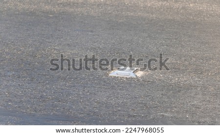  asphalt road cateye closeup view