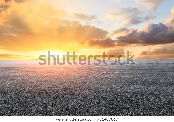 Asphalt
road circuit and sky sunset with car tire
brake