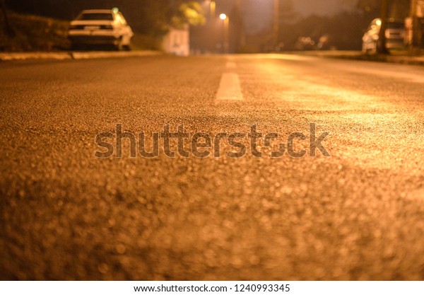 asphalt road\
in city, road at night , cars at\
city