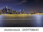 Asphalt road and city skyline with modern buildings scenery at night in Chongqing