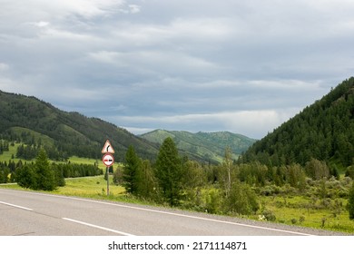 Asphalt Road In Countryside With Mountains And Forest, Cloudy Day In Summer, Exploring The World, Russian Nature Iof Altay, Travel And Adventure, Country Road Trip