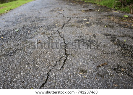 Similar – Cracks in asphalt Pothole