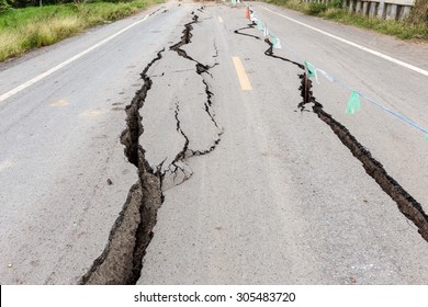 Asphalt Road Cracked And Broken From Earthquake.