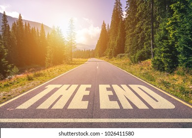 Asphalt Road With The End Text.