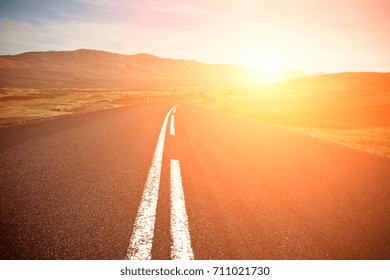Asphalt Road field landscape with the bright solar effect. Highlands of Central Iceland. - Powered by Shutterstock