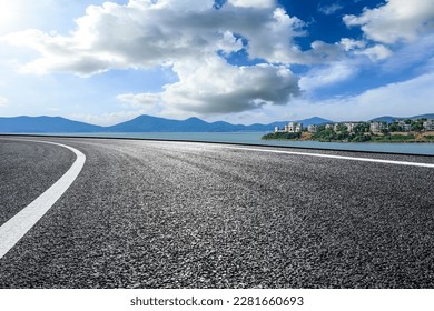 Asphalt road highway by the seaside - Shutterstock ID 2281660693