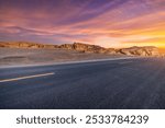 Asphalt road highway and yardang landform mountain natural landscape at sunset. road trip.