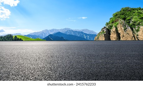 Asphalt road and mountain natural landscape under the blue sky - Powered by Shutterstock