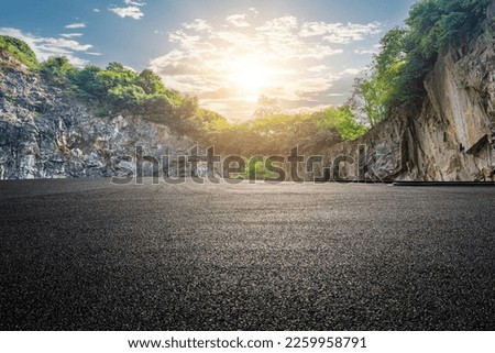 Asphalt road and mountain with sky clouds background at sunset