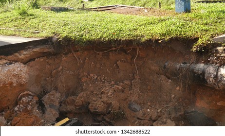 Asphalt Road Path Collapsed, Nature Cross Section Soil Underground With Green Grass, Cutaway Earth Ground Terrain Surface