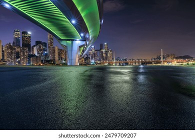 Asphalt road square and bridge with modern city buildings at night in Chongqing. car background. - Powered by Shutterstock