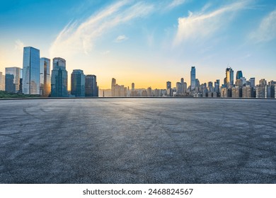 Asphalt road square and city skyline with modern buildings scenery at sunrise in Chongqing