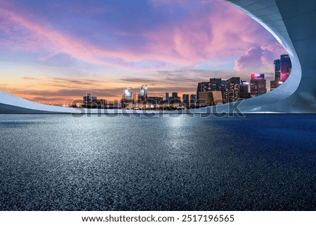 Similar – Image, Stock Photo Dusk in the city with chairs and table in front of a pub