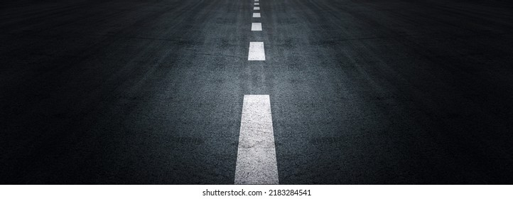 Asphalt Road Texture Background, Black Tarmac Surface With White Marking Stripes, Transport Urban Background, And Dark Street Texture Detail.