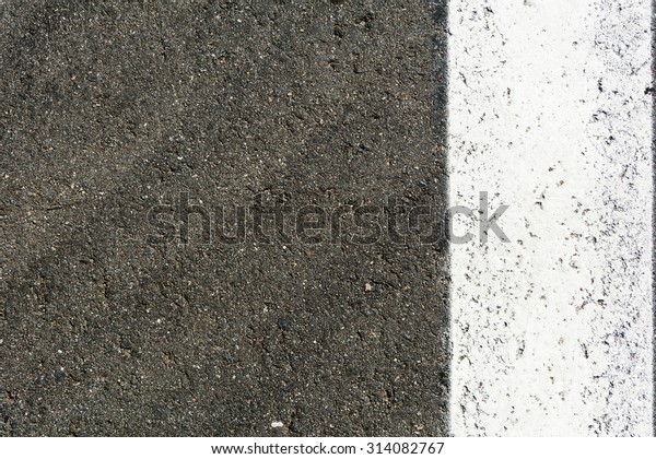 Asphalt road top view background /
Texture of an asphalt road / seamless close up / New asphalt
texture with white line / Asphalt pavement
SeamlessTexture.