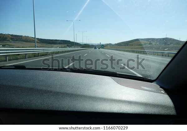 asphalt\
road view from the car, asphalt road\
strips,\
