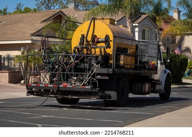 Asphalt Slurry Tar Machine On A Truck 