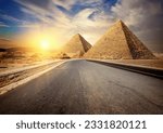 Asphalted road to Giza among the desert