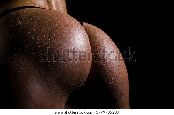 Ass. Sexy womans body in black\
panties. Close up erotic part of the body. Big sexy\
ass