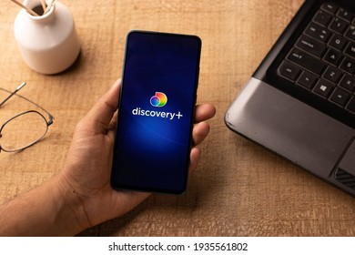 Assam, India - March 10, 2021 : Discovery Plus Logo On Phone Screen Stock Image.