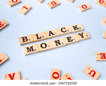 Assam, India - March 30, 2021 : Word BLACK MONEY Written On Wooden Cubes Stock Image.