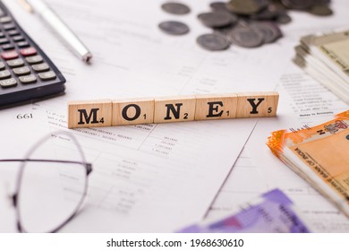 Assam, India - March 30, 2021 : Word MONEY Written On Wooden Cubes Stock Image.