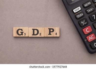 Assam, India - March 30, 2021 : Word GDP Written On Wooden Cubes Stock Image.