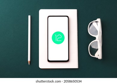 Assam, India - May 19, 2021 : Android 12 Logo On Phone Screen Stock Image.