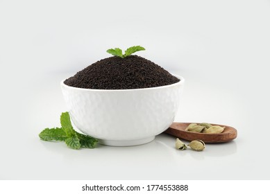 Assam Indian black tea (chai)  Patti Powder Served in White bowl Mari Masala tea.