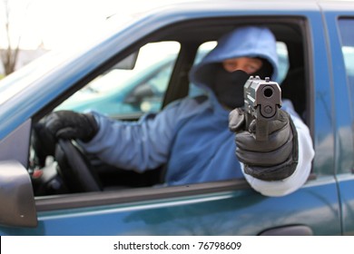 Assassin Shooting From A Moving Car