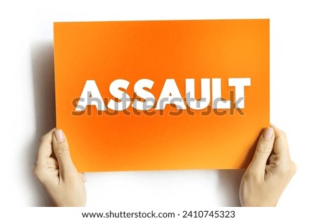 Assault - act of committing physical harm or unwanted physical contact upon a person, text concept on card