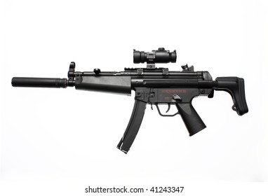 An Assault Gun With Scope And Flash Suppressor.