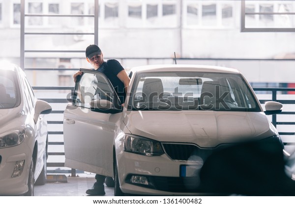 Assaulter is entering in\
the stolen car