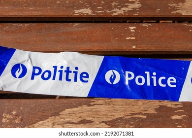 Asse, Belgium, Aug 13, 2022, Warning Tape At A Crime Scene With Belgian Police Text In French And Flemish