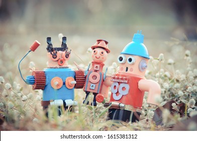 Assemblage robot sculptures family In the lawn - Shutterstock ID 1615381312