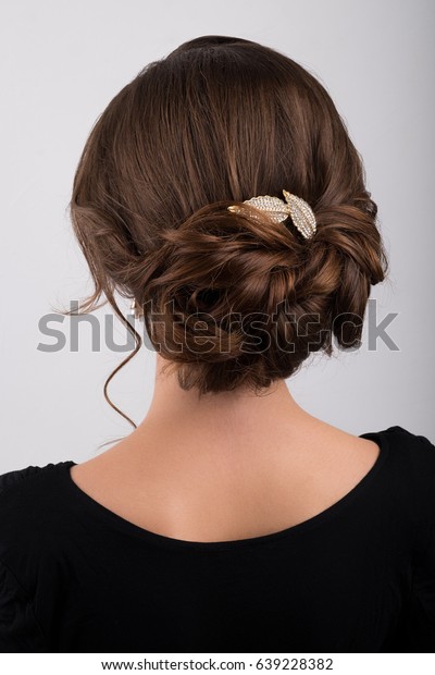 Assembled Formal Hairstyle Dark Hair Decorated Stock Photo